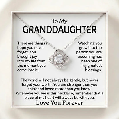 "To My Granddaughter, a Piece of My Heart Goes With You" Love Knot Necklace – Meaningful Keepsake Gift - The Love Sparkle